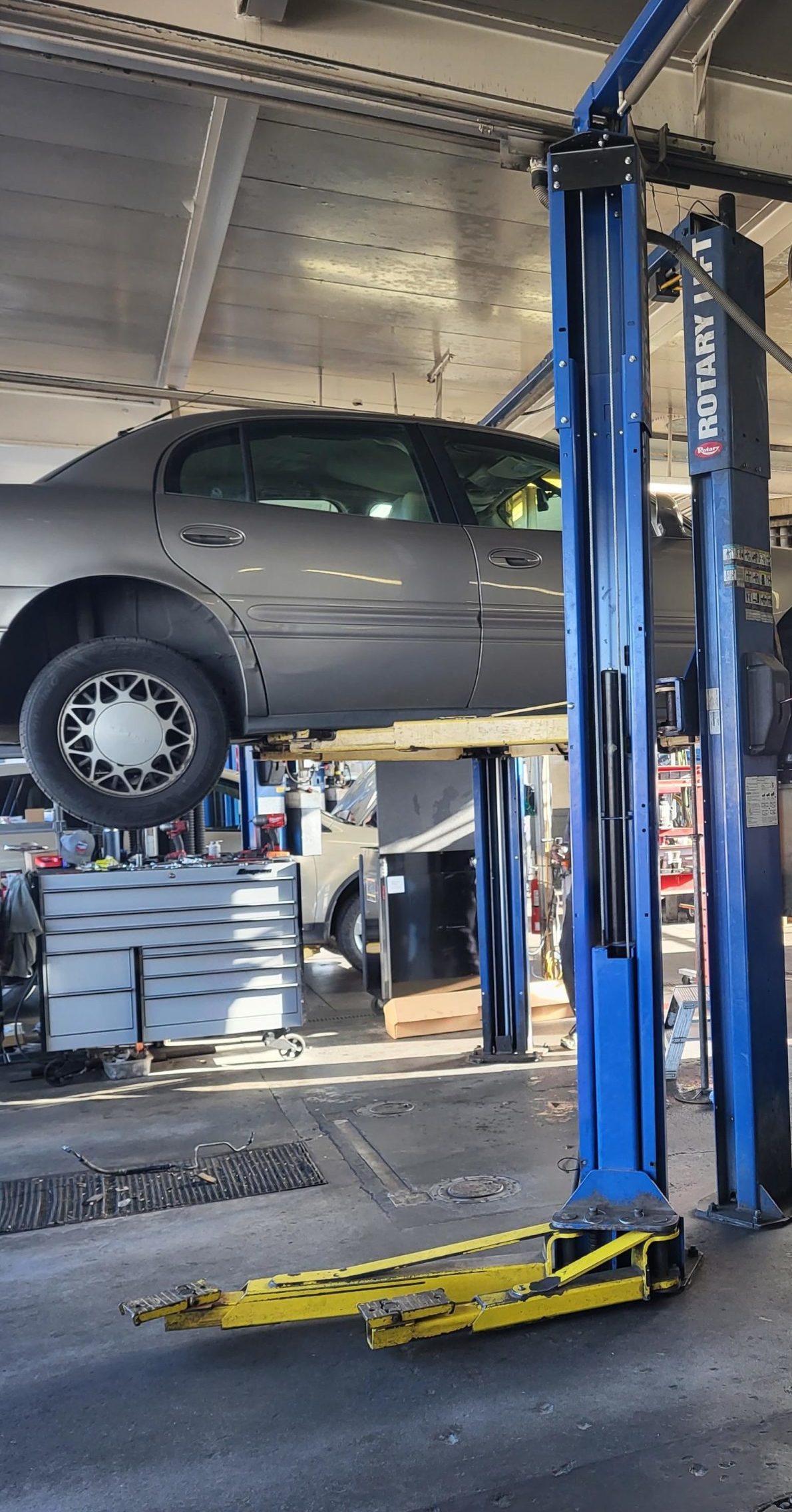 Image of car in Larry's Chevron garage